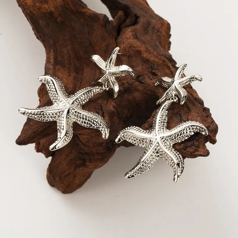 Aretes Sirenis